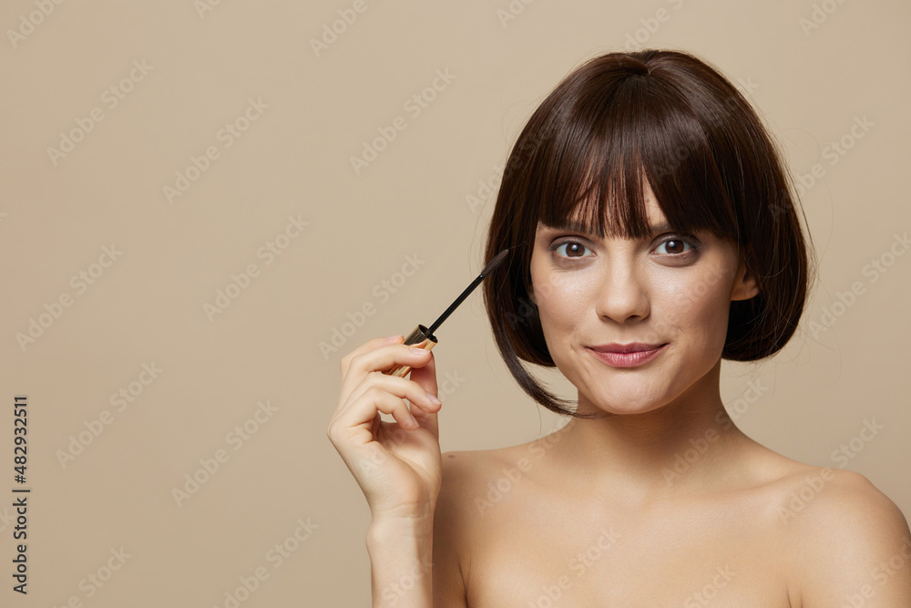 Fototapeta premium beautiful woman smile mascara charm short haircut isolated background