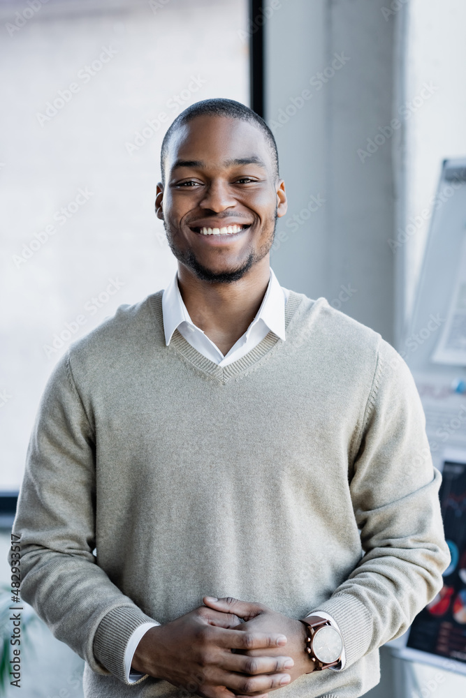 african american man standing with clenched hands. african american man standing with clenched hands.
