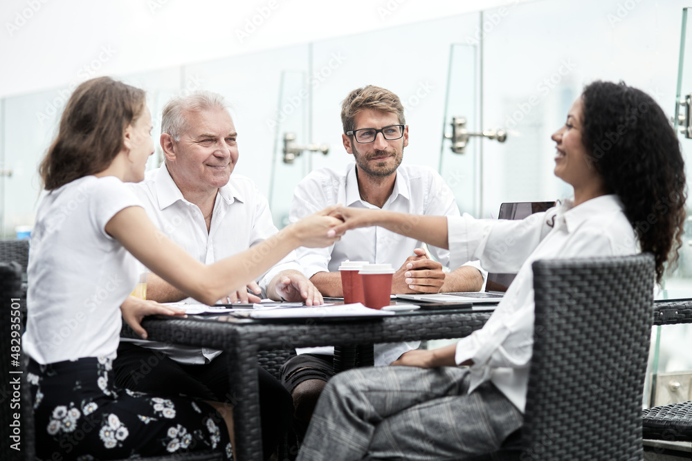 Business handshake. Business handshake and business people concept.