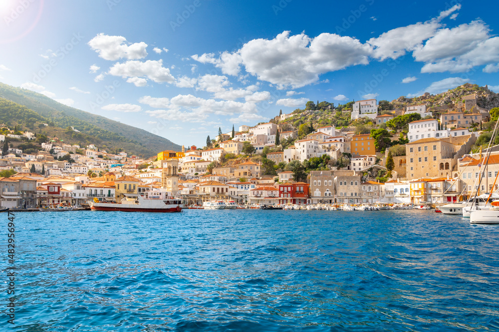 The harbor and port at the Greek island waterfront village of Hydra, one of the Saronic islands of Greece. - obrazy, fototapety, plakaty 