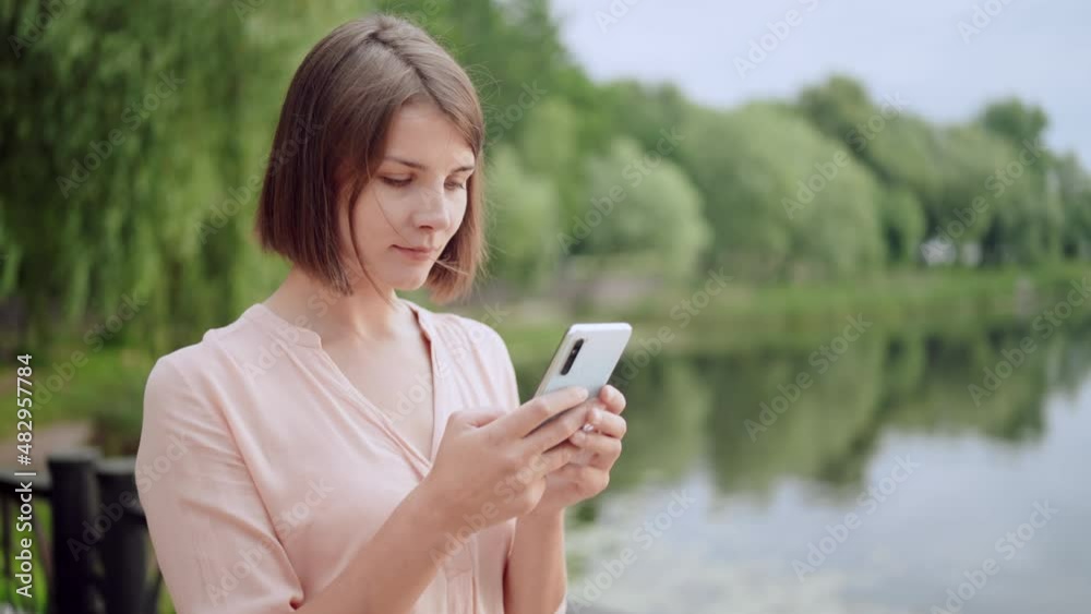 female going on the street messaging on mobile female going on the street messaging on mobile