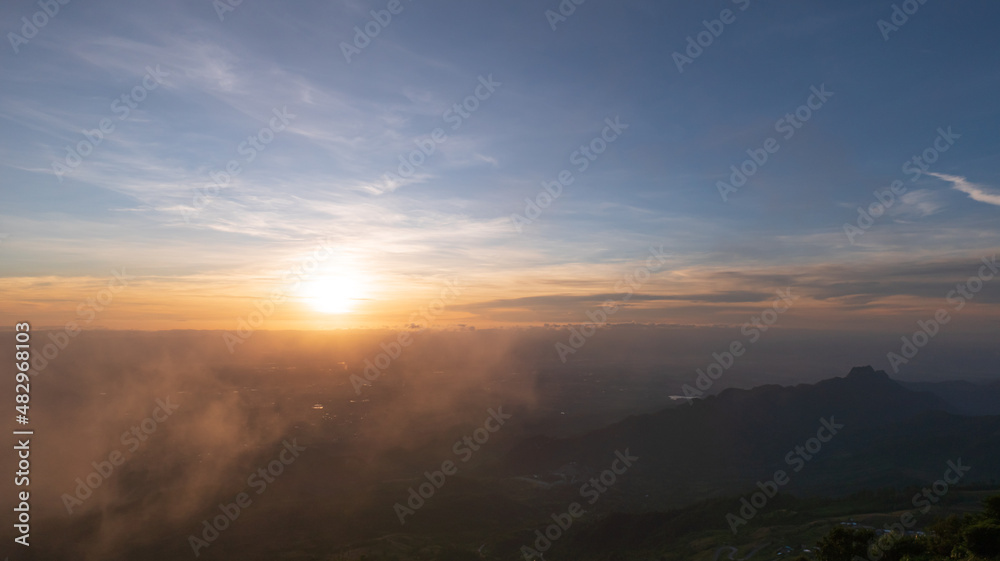 Bright orange sky and light of the sunrise at morning.