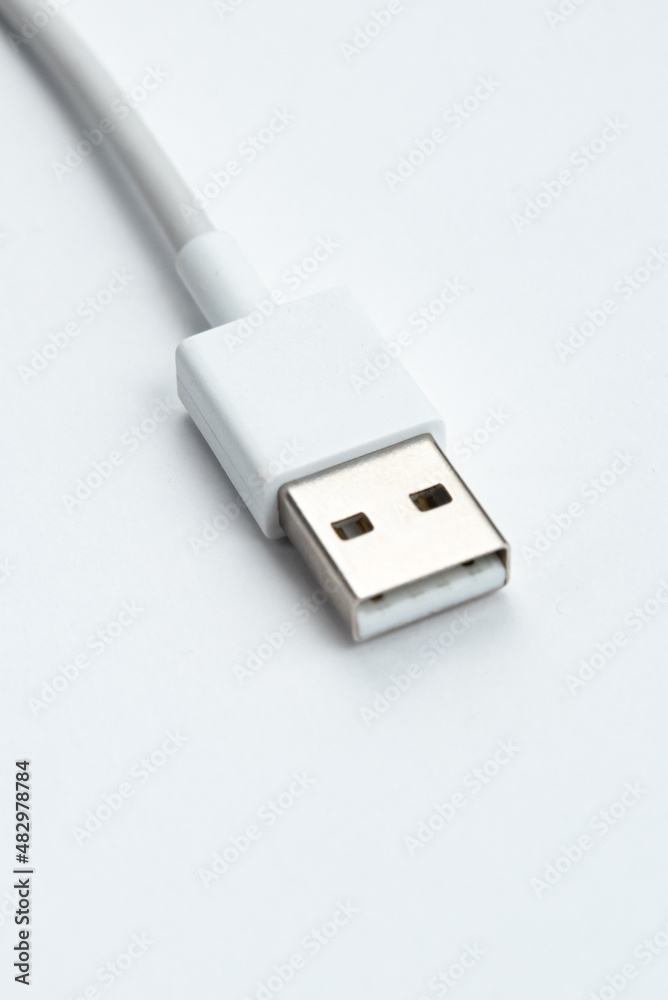 USB cable over white isolated background USB cable over white isolated background