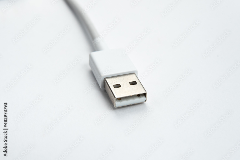 USB cable over white isolated background USB cable over white isolated background
