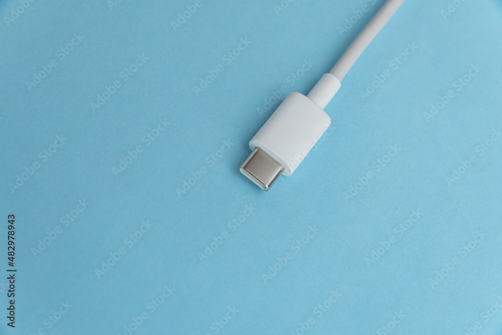 Fototapeta premium USB cable type C over blue background