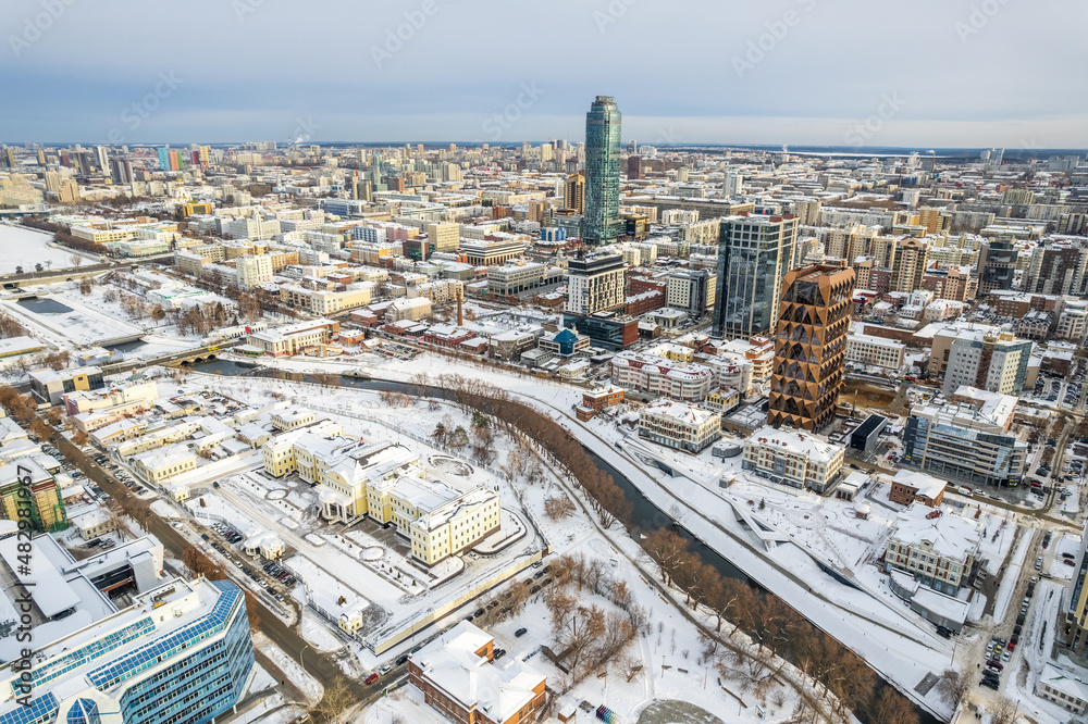 Fototapeta premium Yekaterinburg aerial panoramic view at Winter in cloudy day. Ekaterinburg is the fourth largest city in Russia located in the Eurasian continent on the border of Europe and Asia.