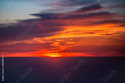 Picture the sunset on an airplane