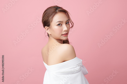 Beautiful young asian woman with clean fresh skin on pink background  Face care  Facial treatment  Cosmetology  beauty and spa  Asian women portrait.