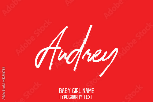 Girl Name Audrey Handwritten Stylish Cursive Brush Text Beautiful on Red Background
