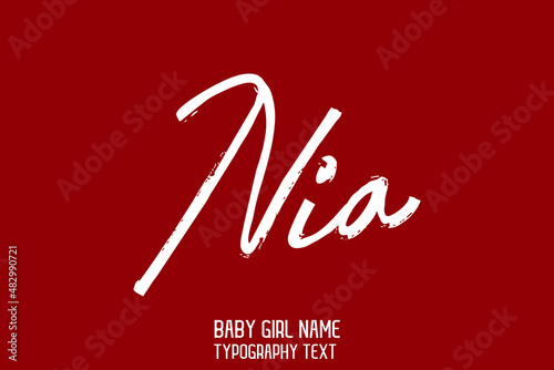 Nia Lettering Sign in Stylish Typography Text Baby Name on Maroon Background photo