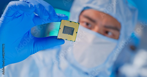Canvastavla engineer holds microchip