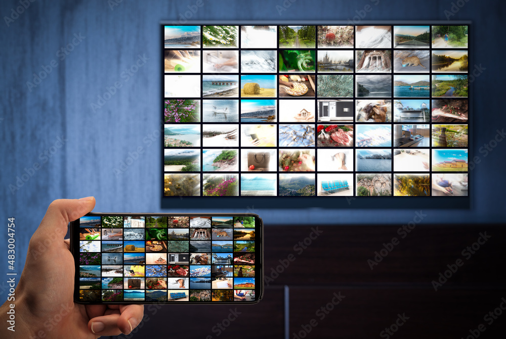 Television streaming, TV broadcast. Television streaming video concept. Media TV video on demand technology. Phone and TV with same image on screens. cross-platform Television streaming, TV broadcast. Television streaming video concept. Media TV video on demand technology. Phone and TV with same image on screens. cross-platform