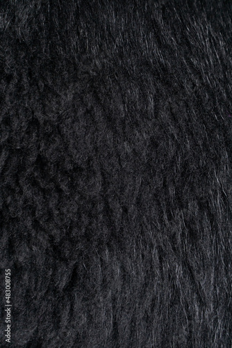 Black shearing fur textured background 