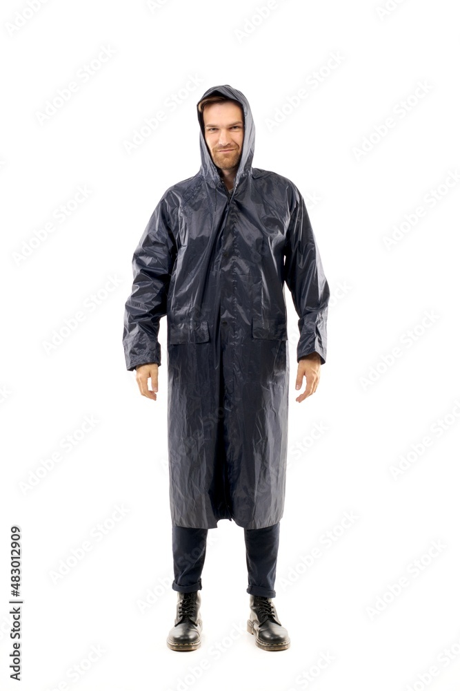 Middle-aged white man wearing a black raincoat standing over isolated white background looking happy and smile. Worker concept. Middle-aged white man wearing a black raincoat standing over isolated white background looking happy and smile. Worker concept.