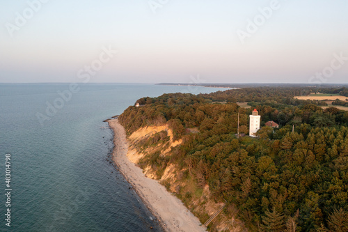 Gilleleje, Denmark - July 23, 2021: Aerial drone view of Nakkehoved Lighthouse in North Zealand