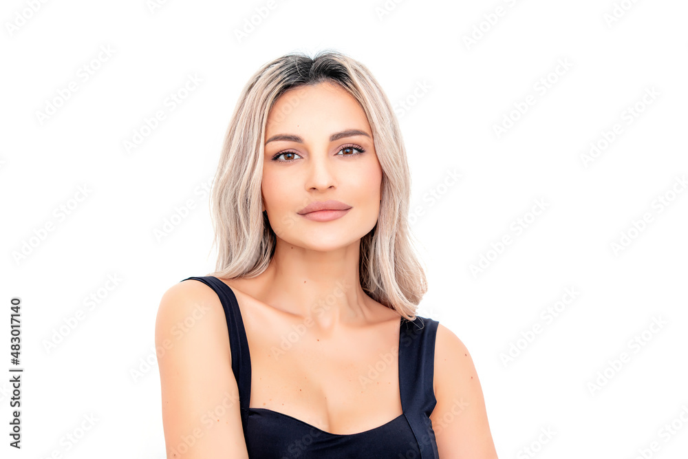 Portrait of a beautiful blonde woman with natural makeup on a white background. Studio shot. Portrait of a beautiful blonde woman with natural makeup on a white background. Studio shot.