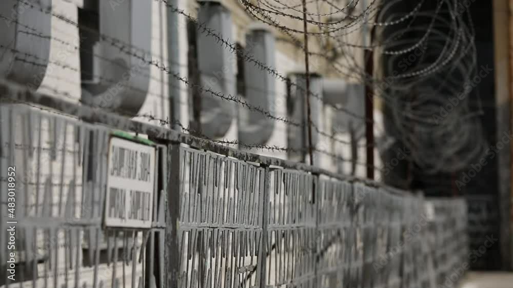 a fence with the inscription forbidden zone passage is prohibited and a tense thorn fence around the entire perimeter. Translation a fence with the inscription forbidden zone passage is prohibited and a tense thorn fence around the entire perimeter. Translation