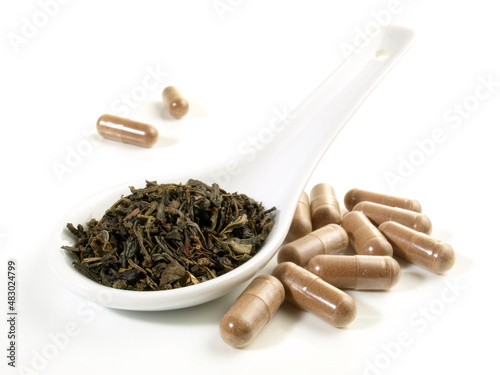 Green Tea with Catechine Capsules isolated on white Background - Healthy Nutrition photo