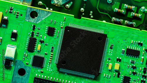 Electronic circuit board. Semiconductor motherboard circuit board technology. Mainboard of computer. Integrated semiconductor microchip on green circuit board. Hi-tech and semiconductor industry.