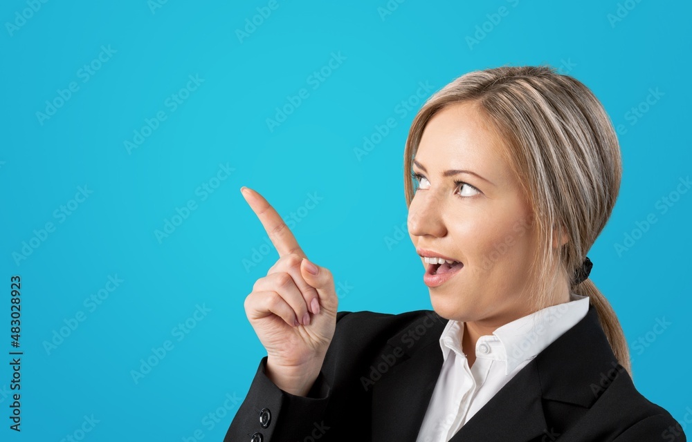 Young attractive cheerful girl demonstrating copy space ad Young attractive cheerful girl demonstrating copy space ad