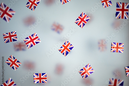Great Britain, national holiday country. Mini flags on a transparent foggy background. concept patriotism, pride and freedom. Platinum Jubilee of Queen Elizabeth II. photo