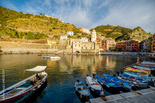 Bay with boats at Vernazza town on the northwestern coast of Italy. Famous village at Cinque Terre National Park