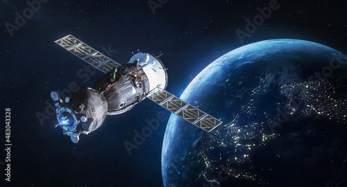 Fototapeta Naklejka Na Ścianę i Meble -  Spaceship on orbit of Earth. Space craft with cosmonauts in outer space. Sci-fi wallpaper. Elements of this image furnished by NASA
