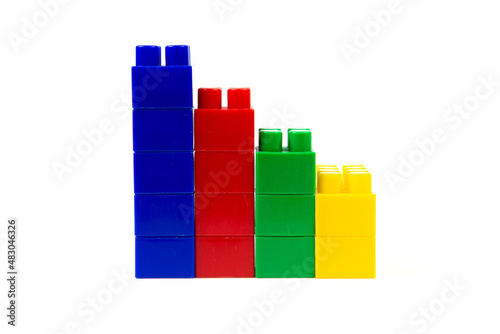 colorful wall-built building blocks isolated on white background. close-up
