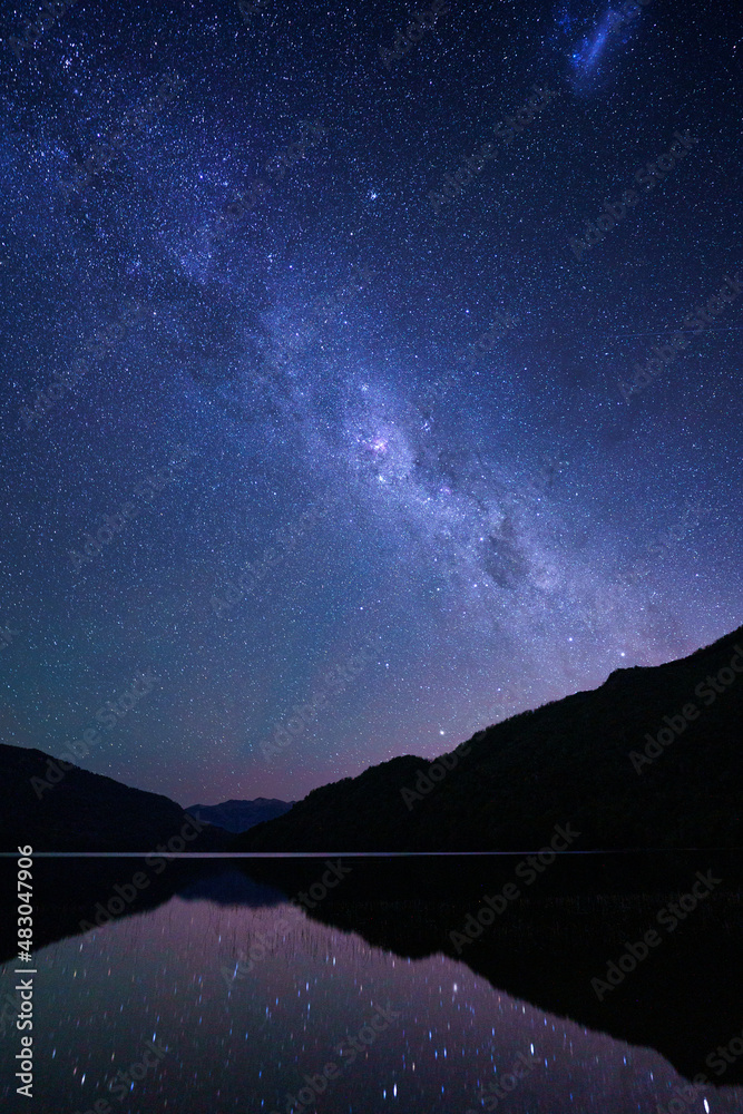 stars over calm lake
