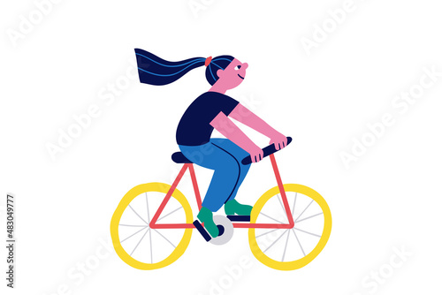 Cartoon girl riding bicycle vector illustration. photo