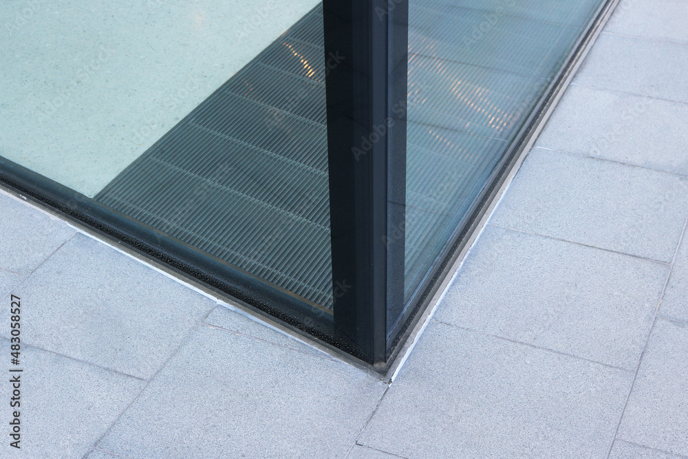 Corner of insulated laminated glass wall Installed on the floor. Stock ...