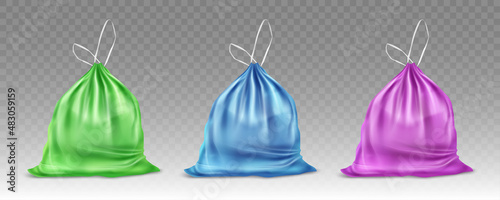 Set of colorful plastic bags for trash and garbage. Vector realistic mockup of polyethylene trashbag. Sack with refuse with tied string isolated on transparent background