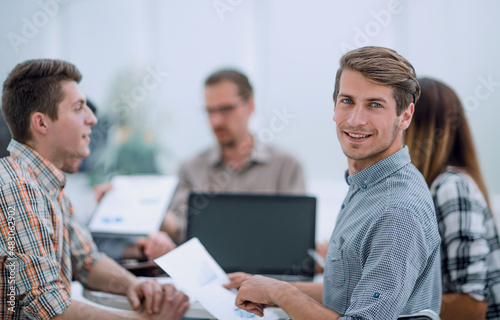 image of a speaker giving a lecture at a business seminar