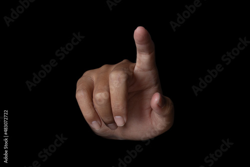 Hand finger pointing isolated on black background. clipping path. Fototapet