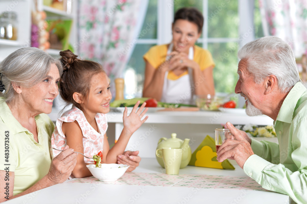 family having breakfast together at home family having breakfast together at home
