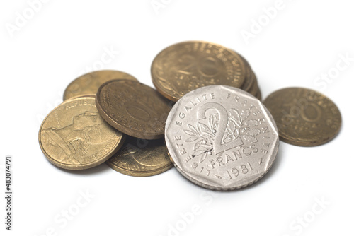 Closeup of vintage french coins on white background