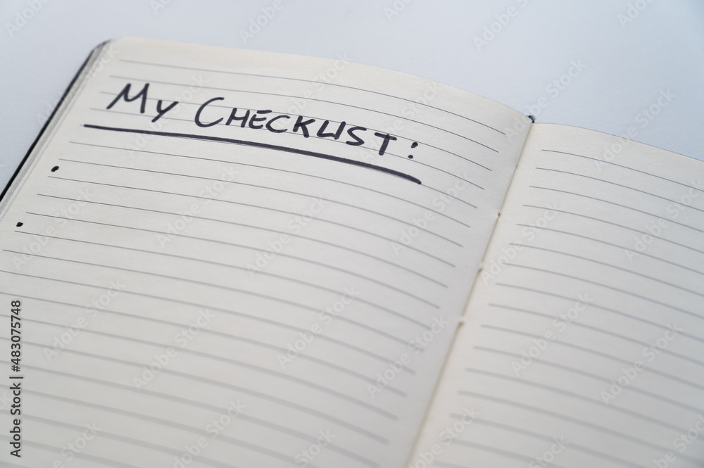 Notebook page marked 'my checklist' in black ink on white paper. Necessity, needs and precision in everyday life.
Notebook page marked 'my checklist' in black ink on white paper. Necessity, needs and precision in everyday life.