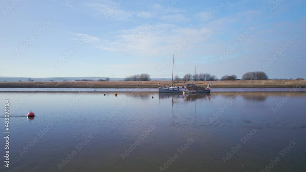 Boat on the River Exe in Topsham from a drone, Exeter, Devon, England, Europe