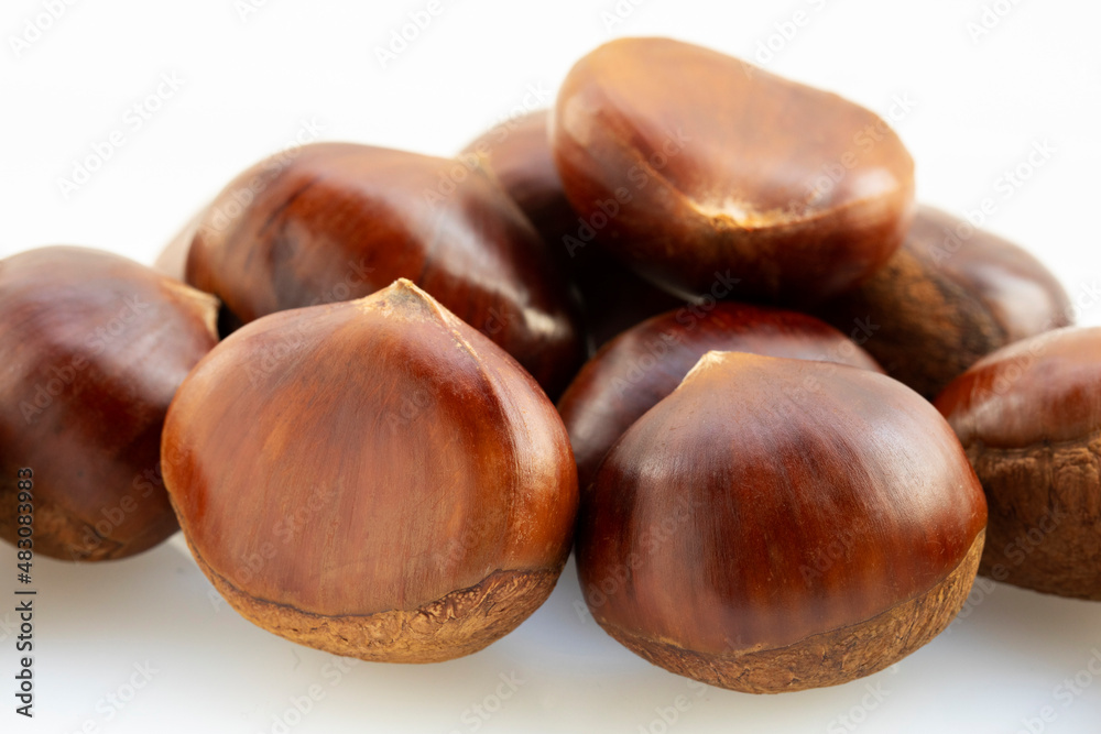 Autumn delicacies, chestnuts, white, white background Autumn delicacies, chestnuts, white, white background