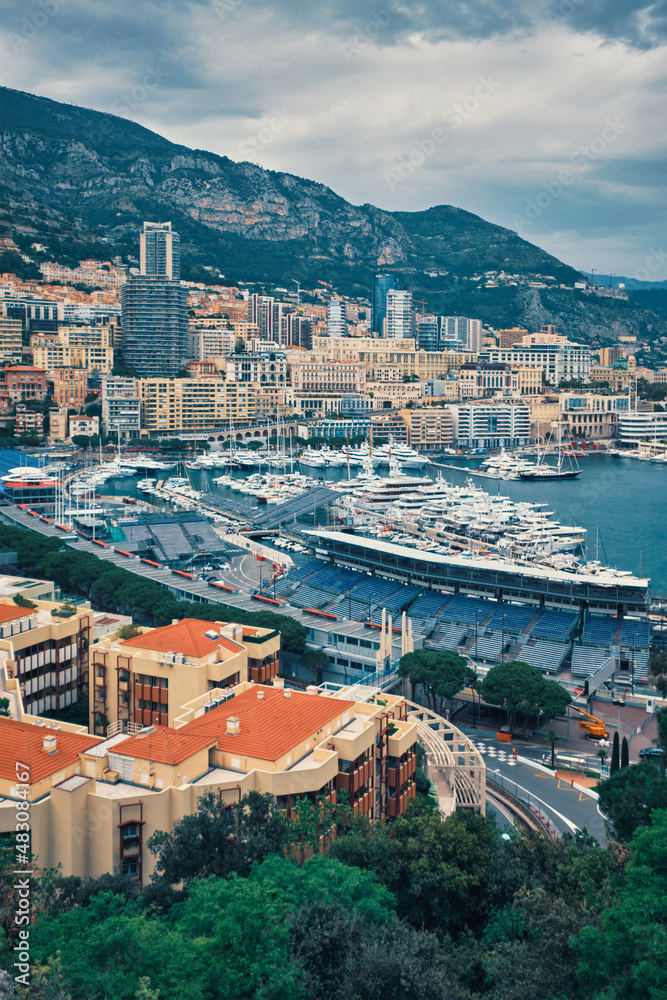View of Monte Carlo, Monaco with Formula One race track street circuit and port with yachts and boats