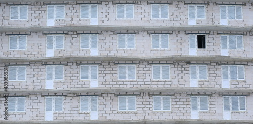 Facade of a modern house under construction, 42 Zanevsky Avenue, St. Petersburg, Russia, January 2022