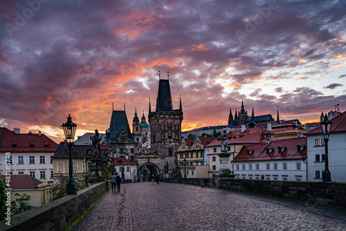 Print op canvas Prague castle and Charles bridge sunset