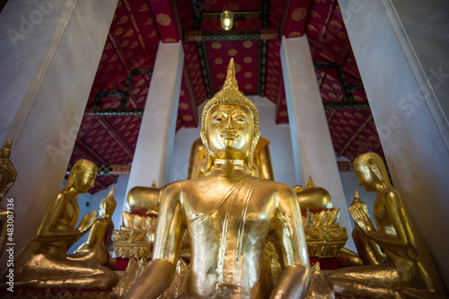 Golden Buddha Statue at Wat Arun Temple in Bangkok, Thailand