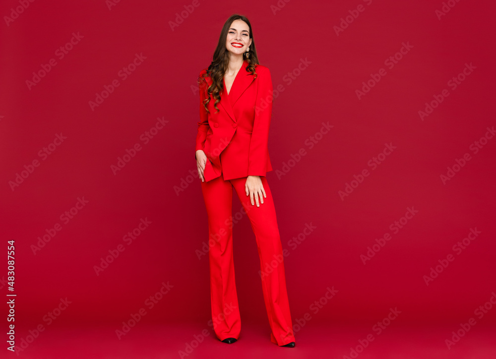 attractive woman celebrating on red background Saint Valentine's Day attractive woman celebrating on red background Saint Valentine's Day