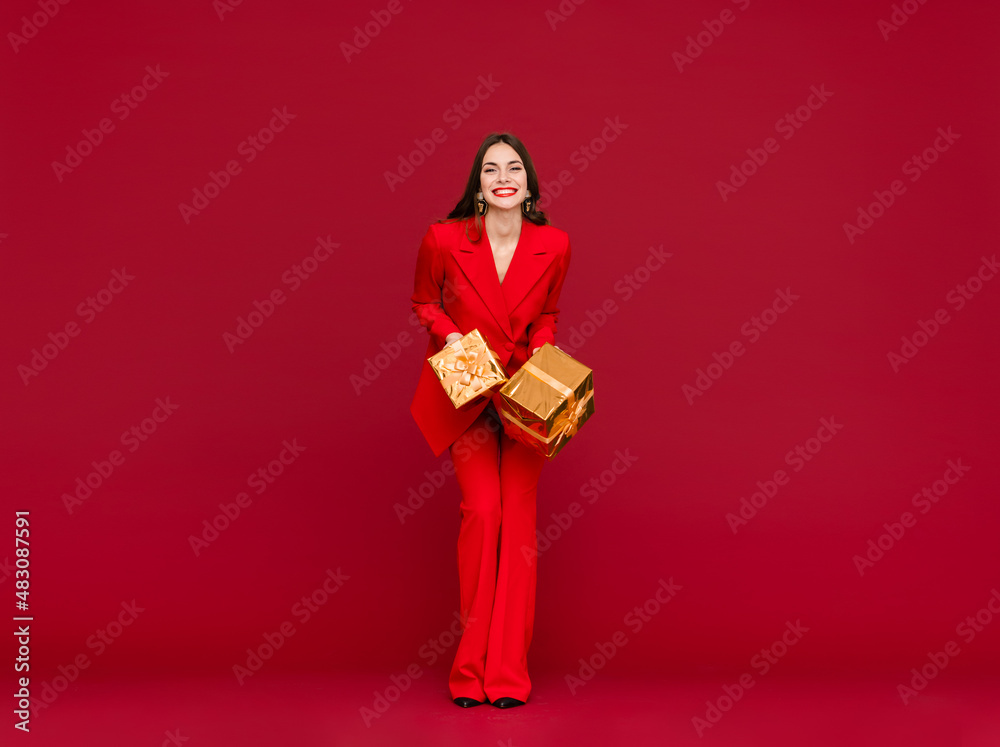 attractive woman celebrating Saint Valentine's Day on red background attractive woman celebrating Saint Valentine's Day on red background