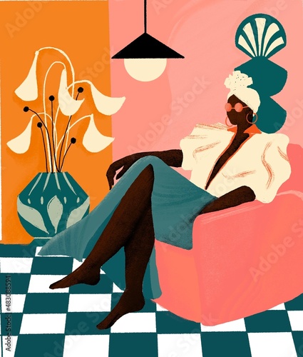 Photography Stylish woman sitting in armchair