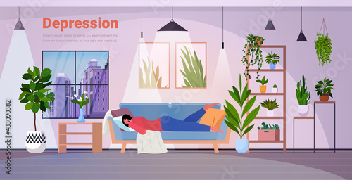 tired depressed woman lying on sofa unhappy girl feeling desperate mental health diseases depression concept