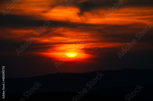 Amazing and dramatic red and orange sunset sky. Beautiful color nature landscape. © Dragoș Asaftei