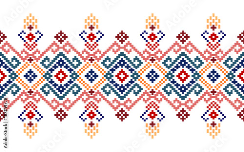 Pixel pattern. Cross Stitch. Geometric ethnic oriental pattern traditional Design for clothing, fabric, background, wallpaper, wrapping, batik. Knitwear,  Embroidery style. Vector.