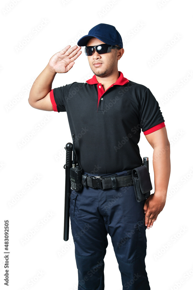 A security guard wearing black glasses, wearing a cap, salutes, has rubber batons and handcuffs on his tactical belt. isolated white background Eliminate the concept of security A security guard wearing black glasses, wearing a cap, salutes, has rubber batons and handcuffs on his tactical belt. isolated white background Eliminate the concept of security